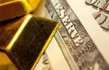 Giá vàng thế giới giảm hơn 1% do đồng USD mạnh lên