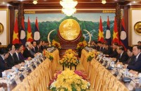 top vietnamese leader seeks stronger relations with laos