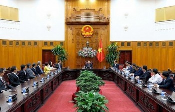 PM encourages Singaporean firms to invest in Vietnam