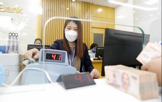 Reference exchange rate down 20 VND