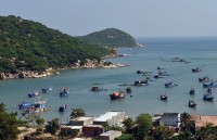 climbing up thoi loi mountain in ly son island