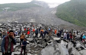 Seven Vietnamese die in flash floods, landslides in China