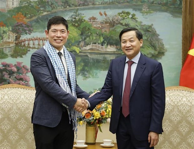 Deputy PM Le Minh Khai receives Grab leader