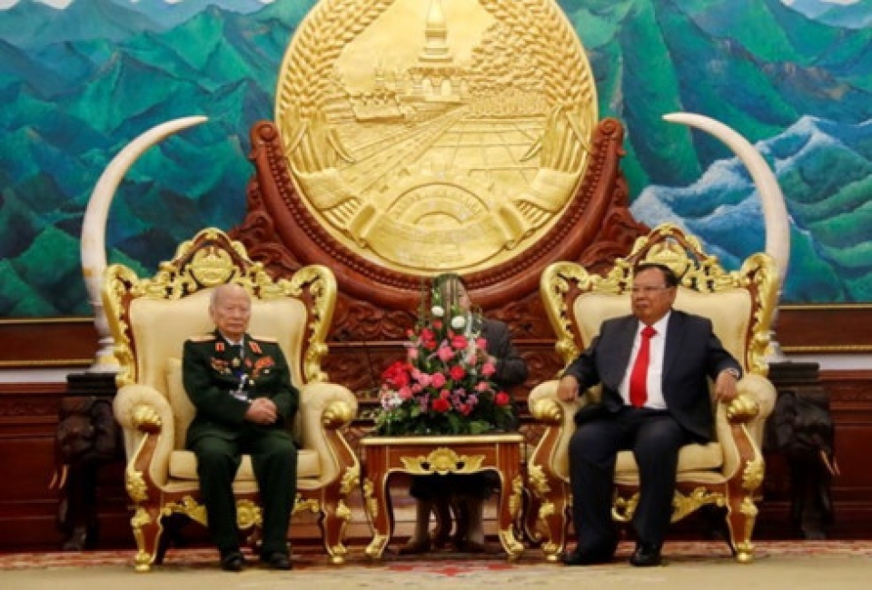 lao party chief lauds dedication of vietnamese volunteer soldiers