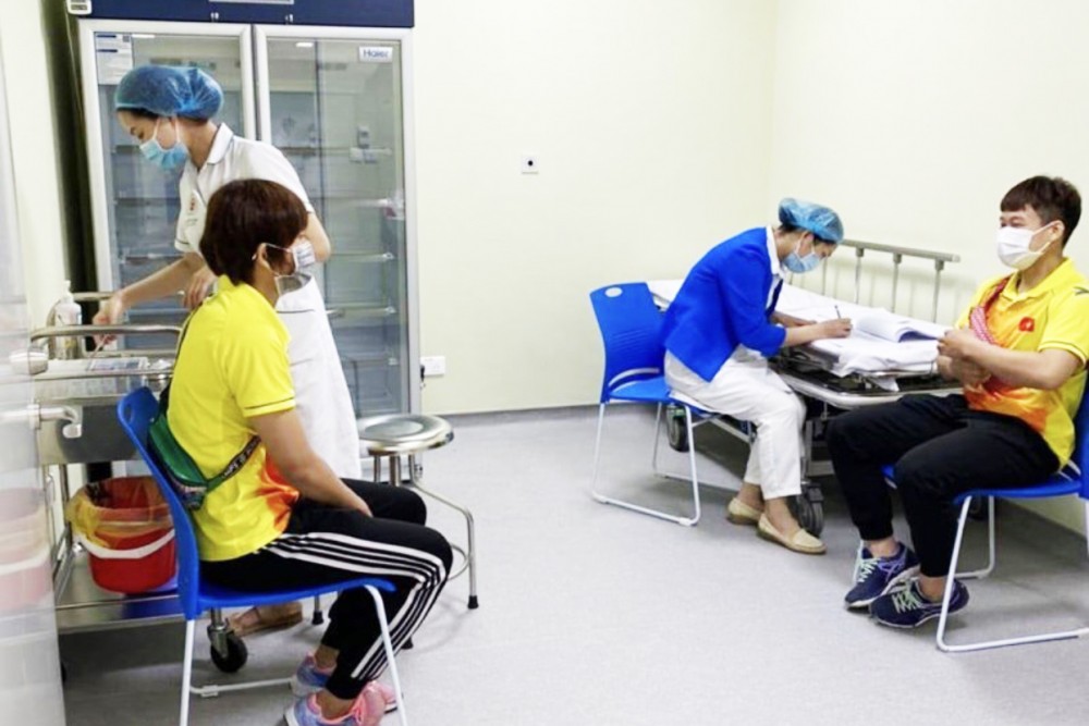 Các VĐV Việt Nam đầu tiên được tiêm vaccine phòng Covid-19. Ảnh Nhandan.com.vn