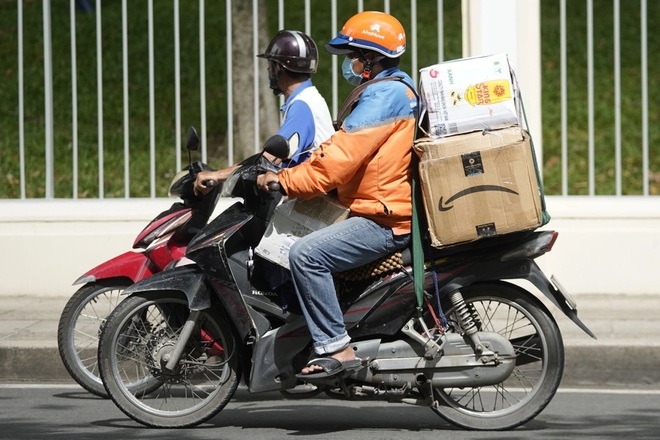 TP Hồ Chí Minh cho phép giao hàng được quản lý bằng ứng dụng công nghệ (shipper). (Nguồn: Phạm Nguyễn).