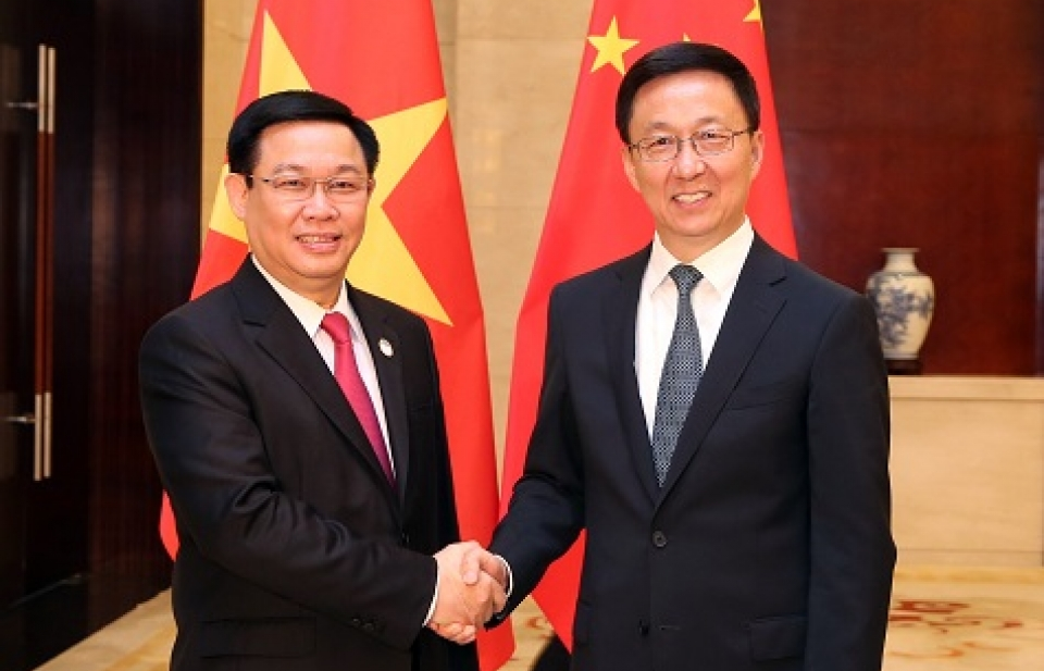 Phó Thủ tướng Vương Đình Huệ hội đàm với Phó Thủ tướng Trung Quốc
